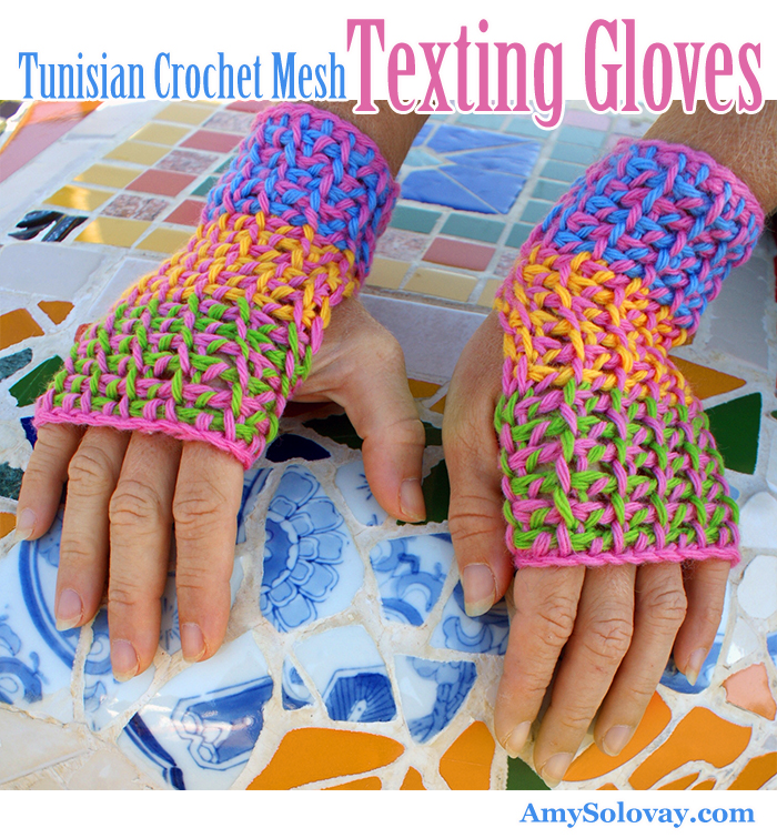 In this picture, you can see a couple of the things I've been talking about. These texting gloves show you an example of a colorwork pattern you can crochet using the Tunisian crochet mesh stitch. And they're photographed at Baltimore Park, with one of the mosaic benches as a backdrop. I LOVE how all the elements of this picture came together.