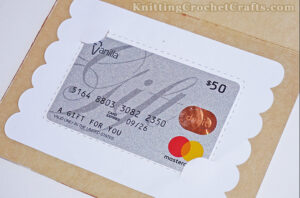 The inside of this wedding card features a gift card holder you can make using a die by Emily Moore Designs.